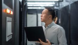 asian engineer working in database