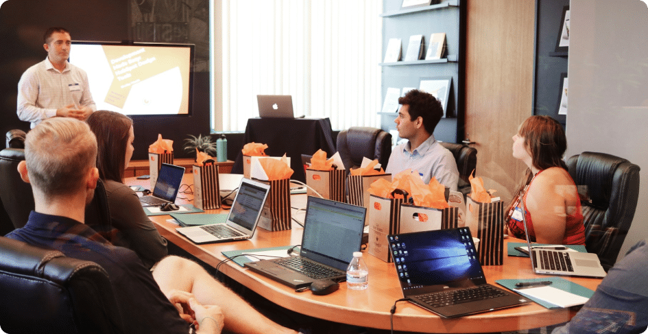 Team discussion during a corporate meeting on innovative Business Solutions and digital transformation strategies